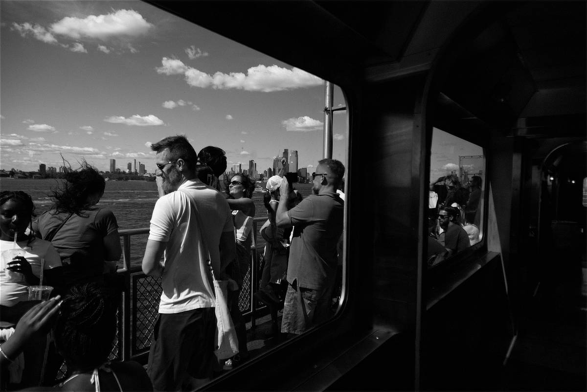 photograph of people on the Staten Island Ferry